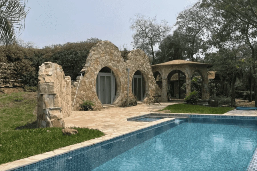 House with a pool in an eco-village